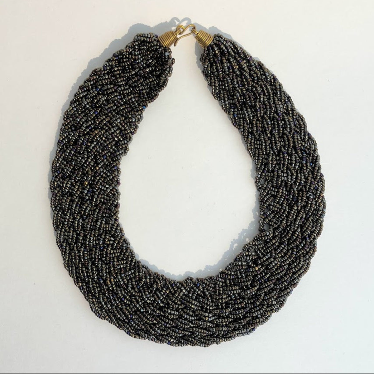 Braided bead strand collar necklace